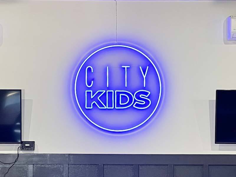 City Church of Ventura LED neon lights City Kids sign creates a fun welcoming atmosphere.