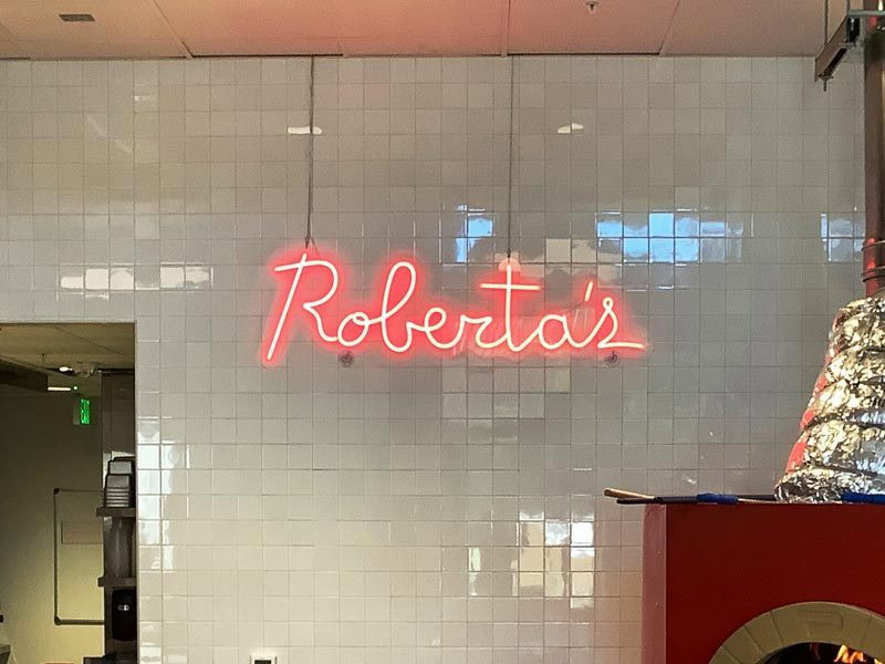 Custom neon signs Los Angeles – Even small LED neon signs like this one for Roberta's in Studio City add personality to the business.