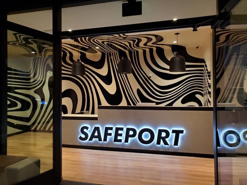 Channel letters can also be used as indoor signs like this halo-lit sign for Safeport in Oxnard, California.