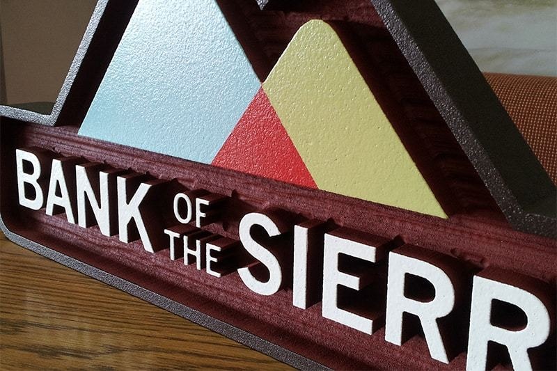 A close up view of this striking indoor sign at Bank of the Sierra, a perfect blend of elegance and visibility.