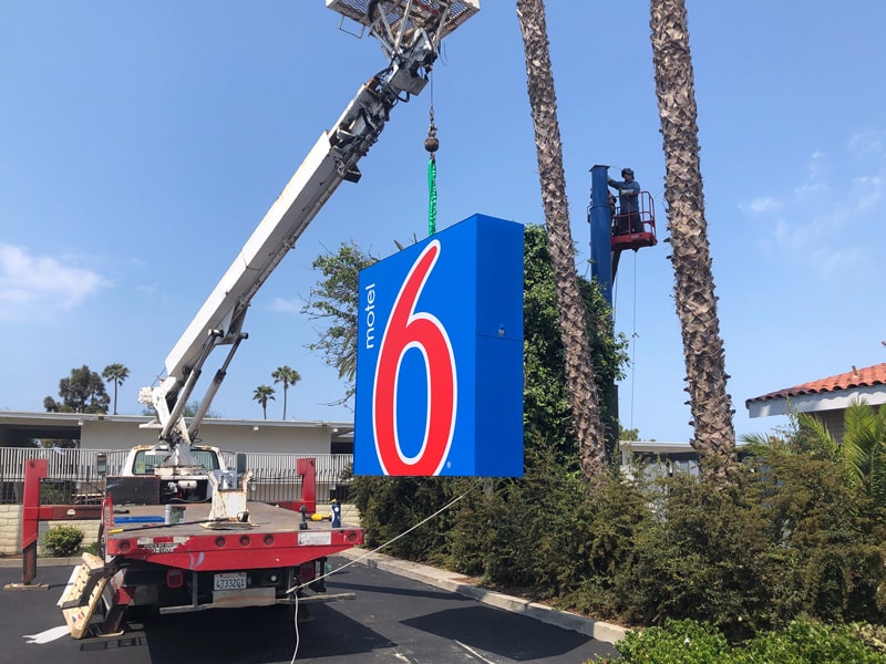 Motel 6 pylon sign repair services and installation in Ventura, California by Dave's Signs.