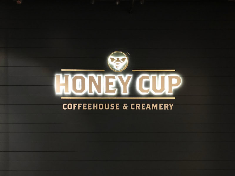 Honey Cup illuminated indoor halo-lit channel letter sign in Oxnard, California.